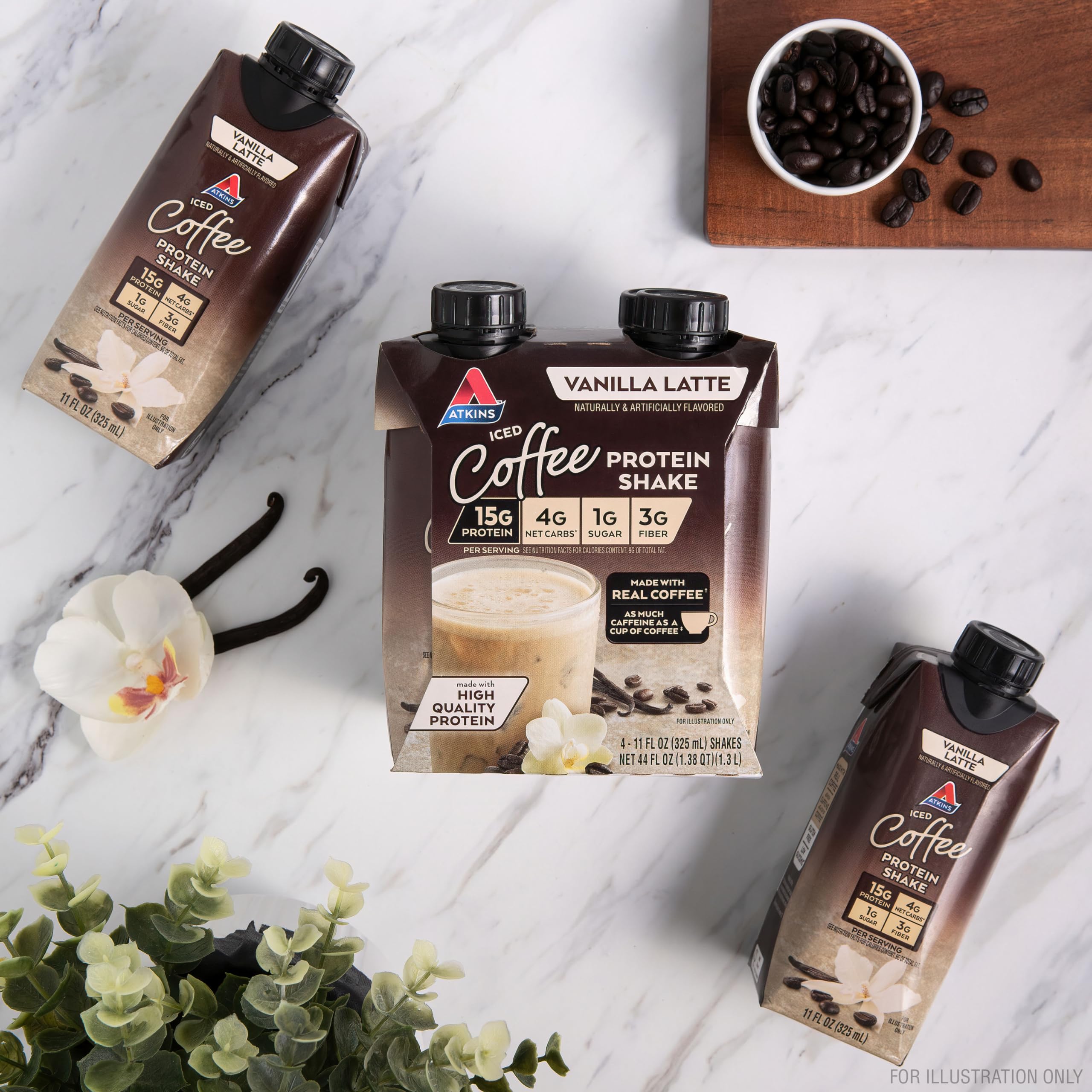 Coffee splash beside Atkins shake emphasizes real coffee taste