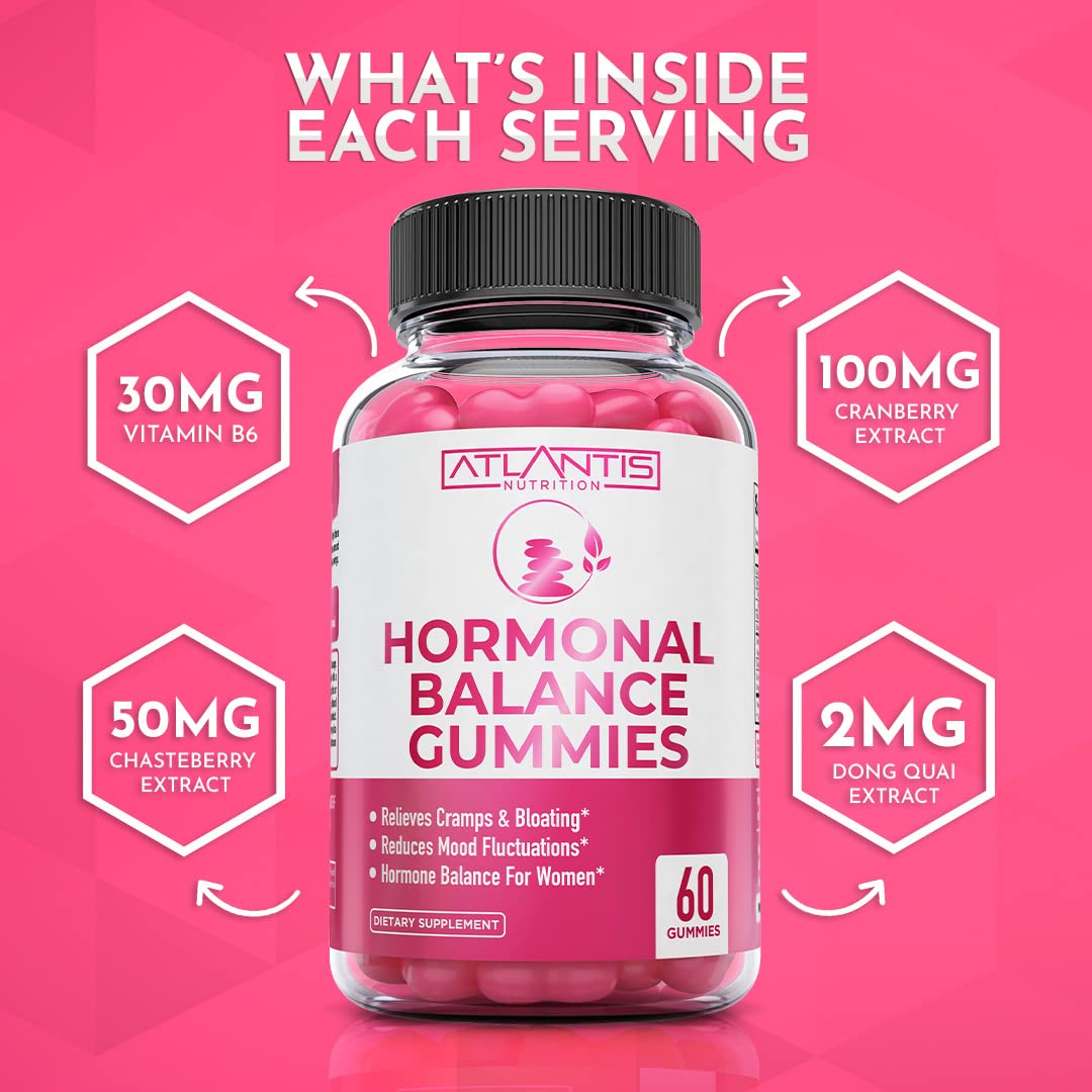 Dose spoon with Atlantis Nutrition Hormonal Balance capsules ready to take