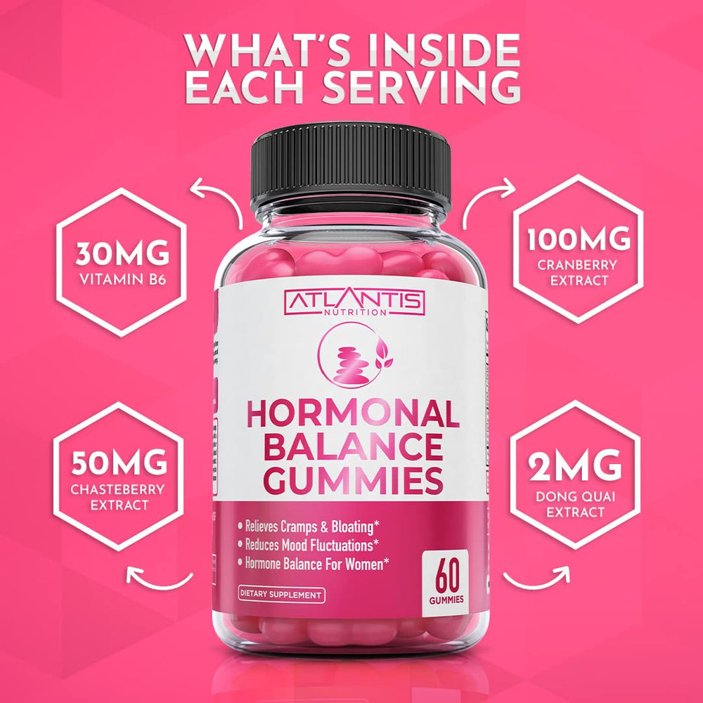 Dose spoon with Atlantis Nutrition Hormonal Balance capsules ready to take