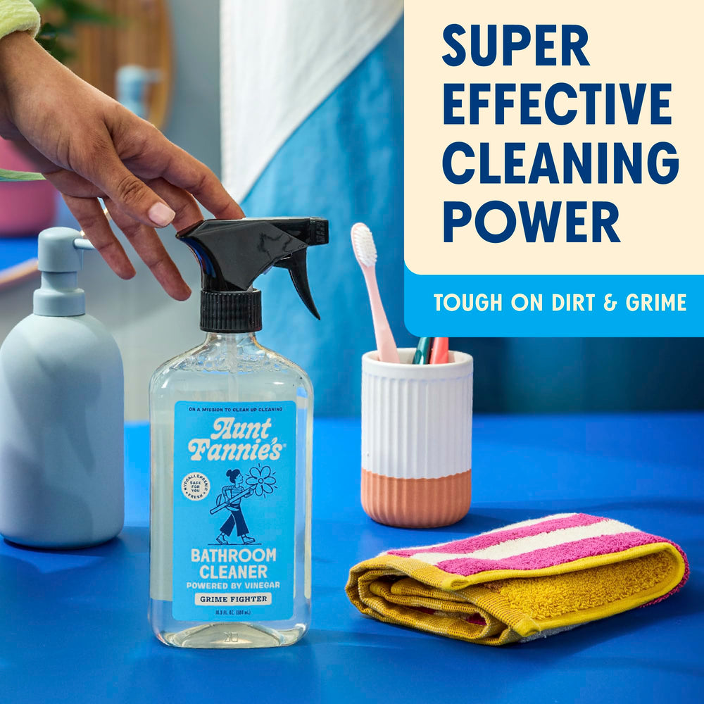 Aunt Fannie's all-purpose bathroom cleaner spray-action demonstrates fast-acting grime lifting on surfaces.