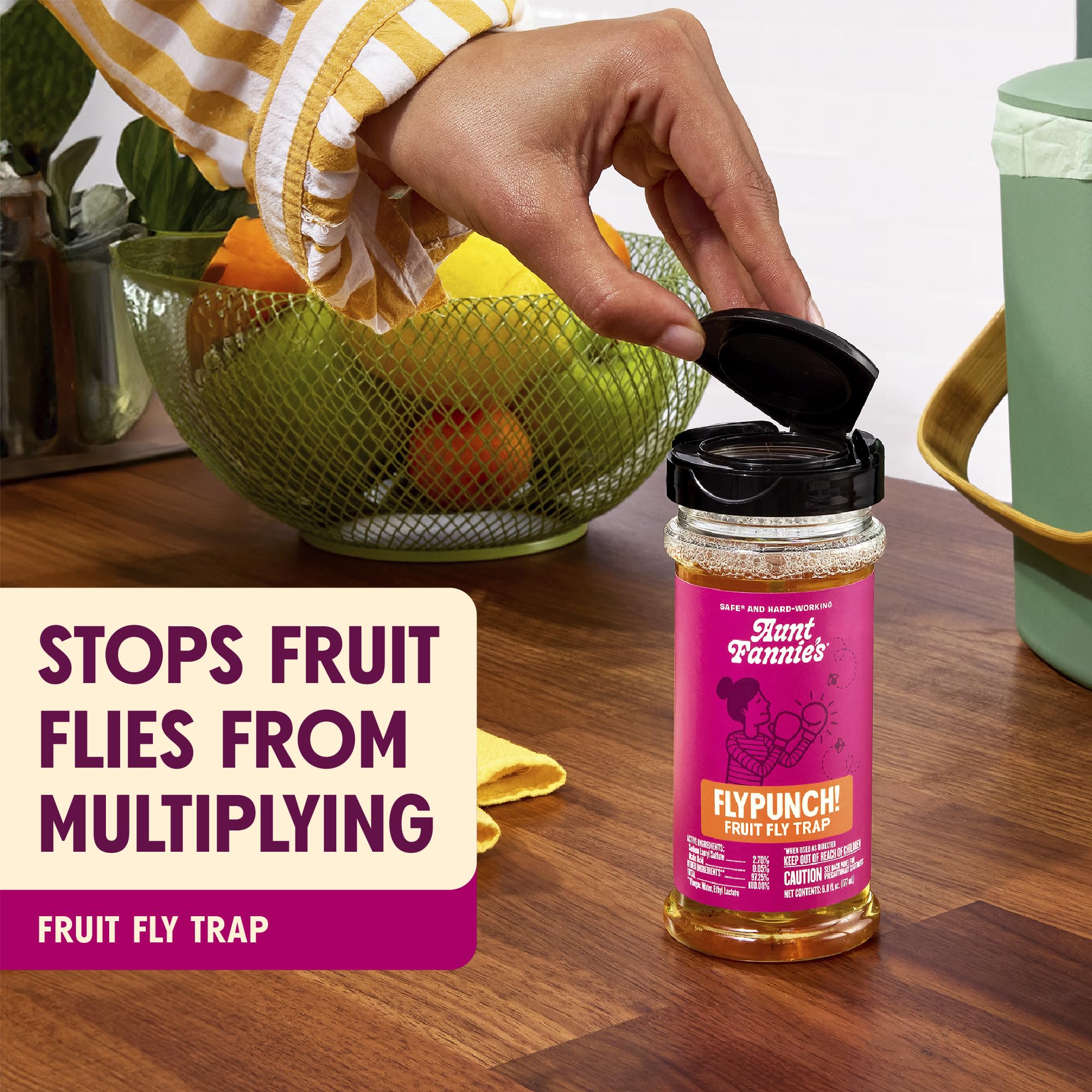 Aunt Fannie's FlyPunch attractant bait drawing fruit flies toward the trap.