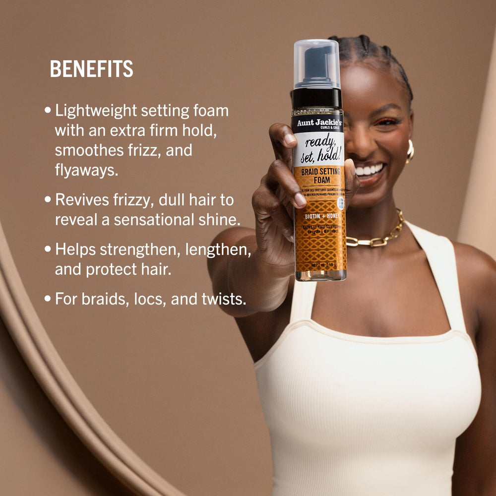 Aunt Jackie’s braid-twist styling on natural hair demonstrates versatile texture management