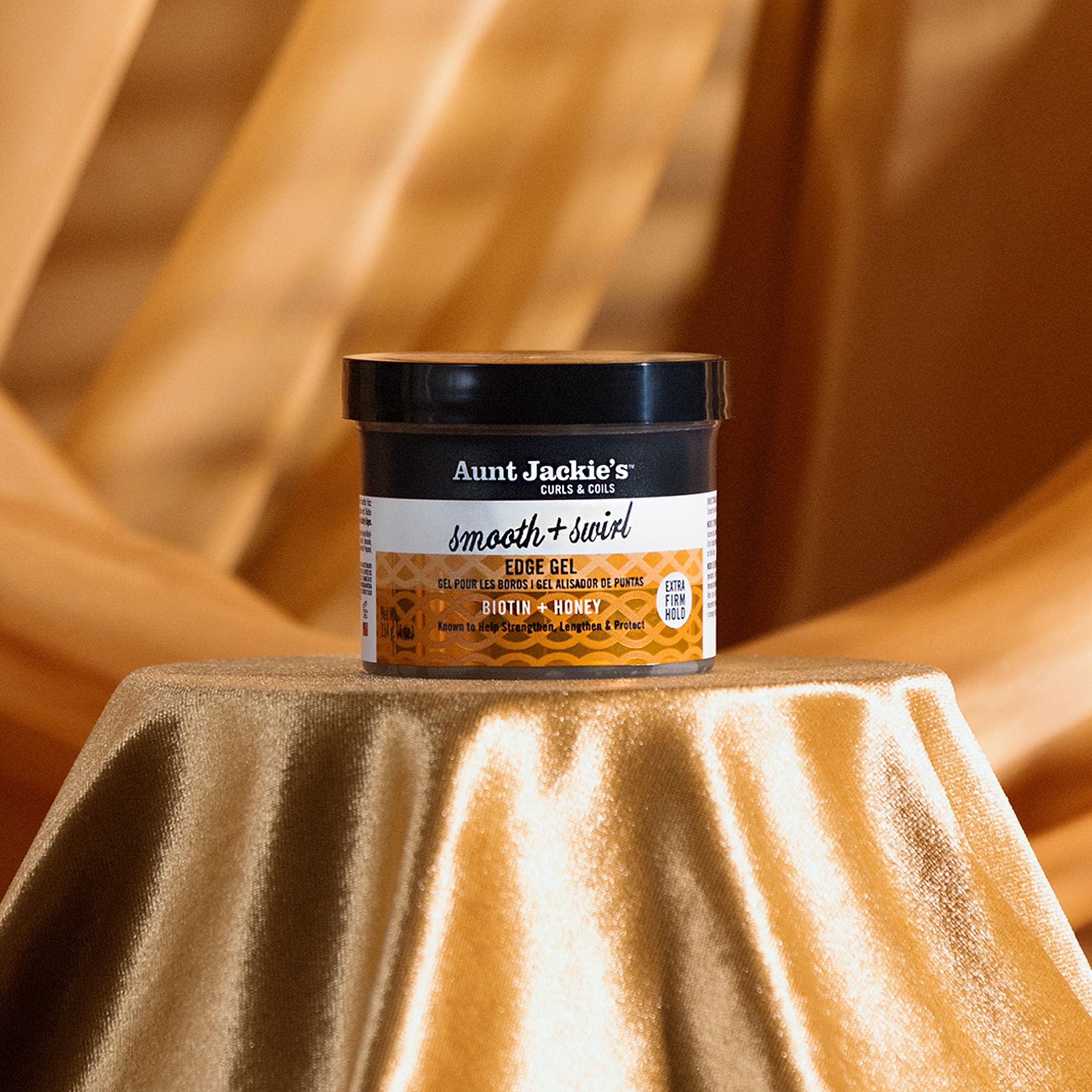 Aunt Jackie's edge gel applied around the hairline for neat edges.