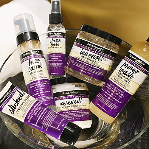 Aunt Jackie's Frizz Patrol mousse being applied with a small amount.