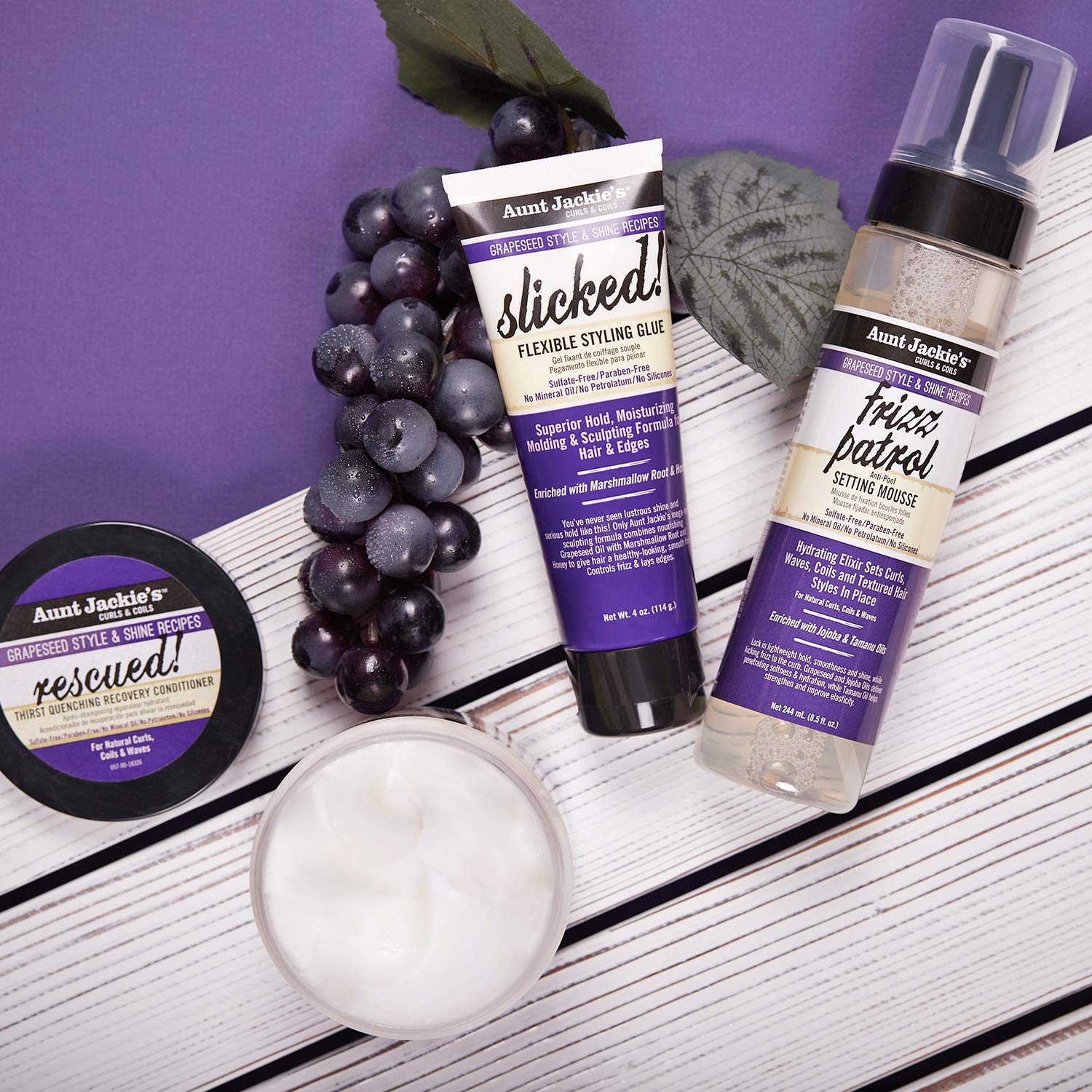 Aunt Jackie's Frizz Patrol mousse on hair with improved manageability.