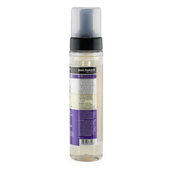 Aunt Jackie's Frizz Patrol pump dispensing mousse for easy styling.