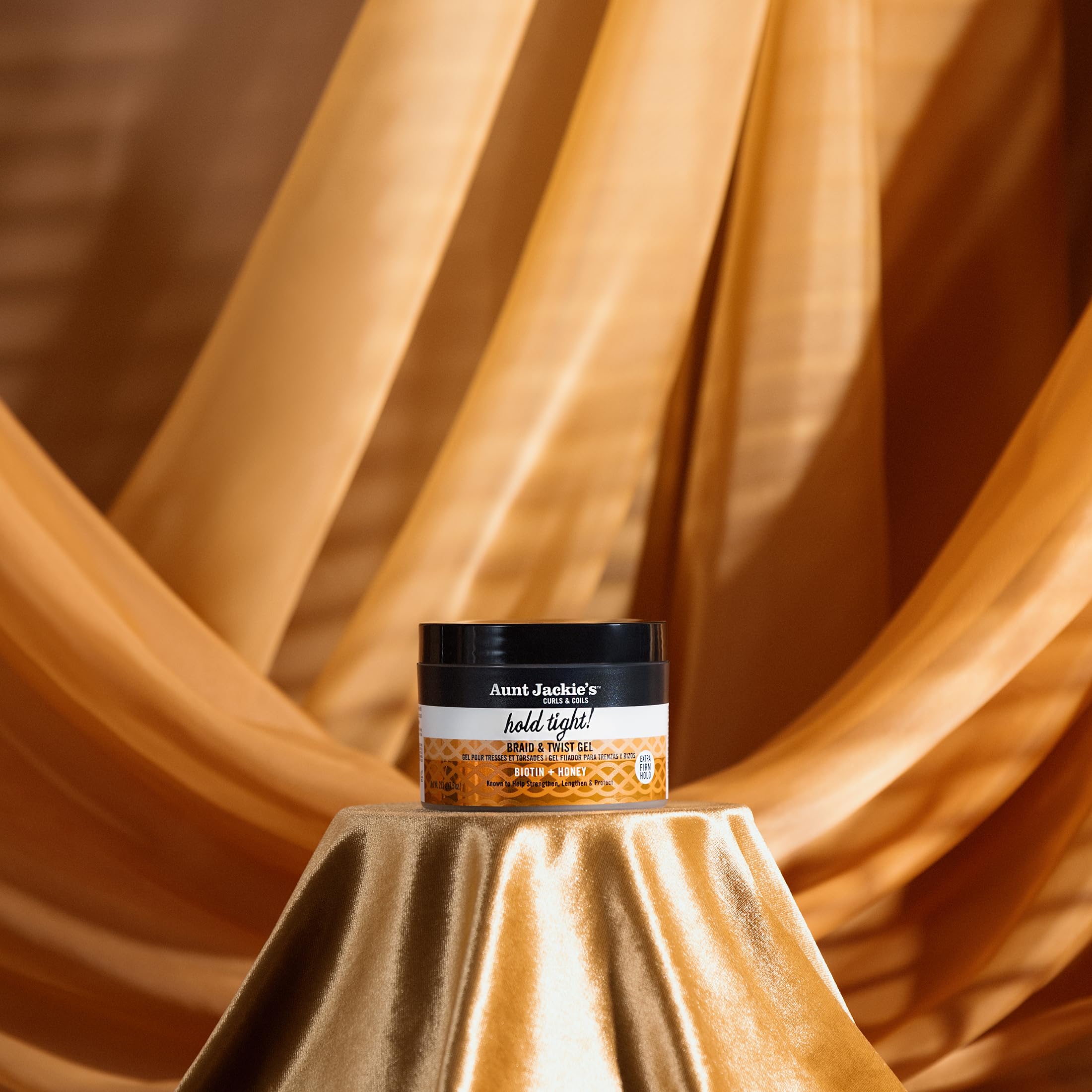 Aunt Jackie's Hold Tight gel air dries under hooded dryer to set style.
