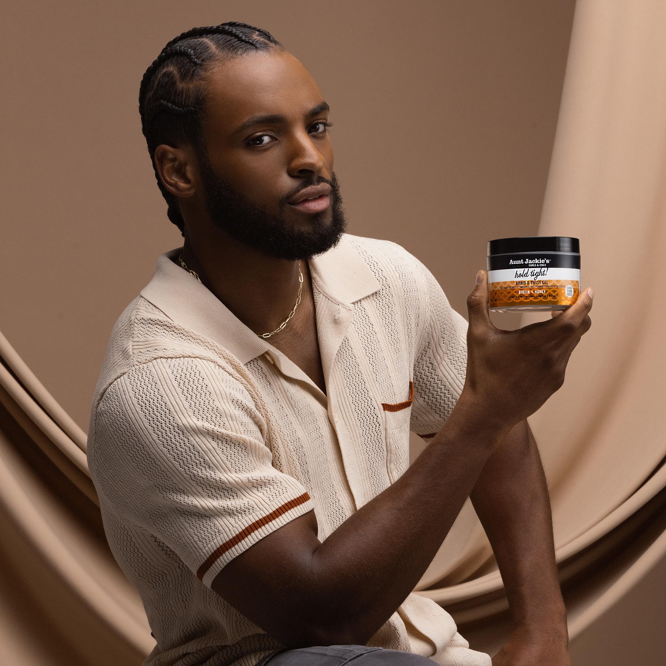 Aunt Jackie's Hold Tight gel for locs twists with defined shape.