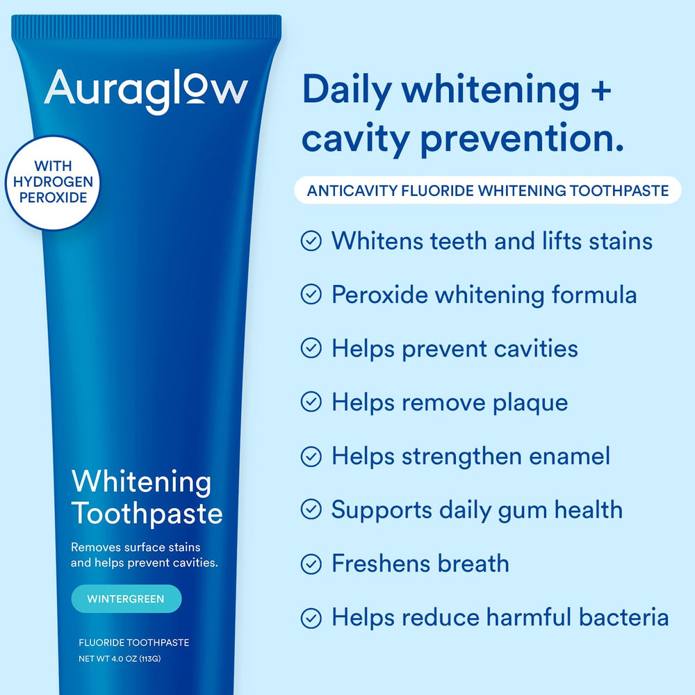 Auraglow toothpaste foam on brush demonstrating gentle daily whitening.