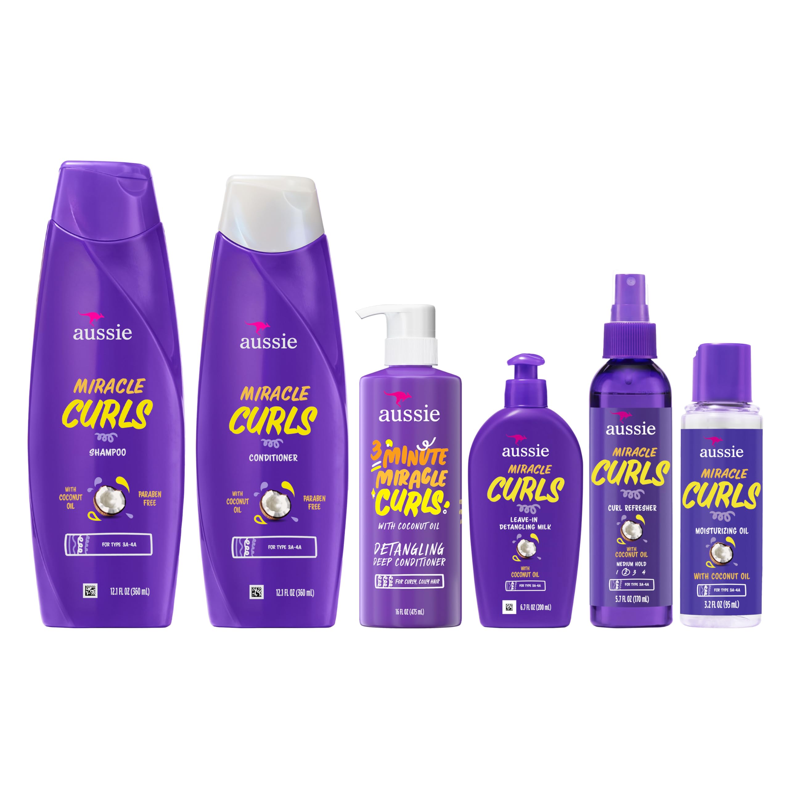Close-up of defined curls hydrated by Aussie Miracle Curls.