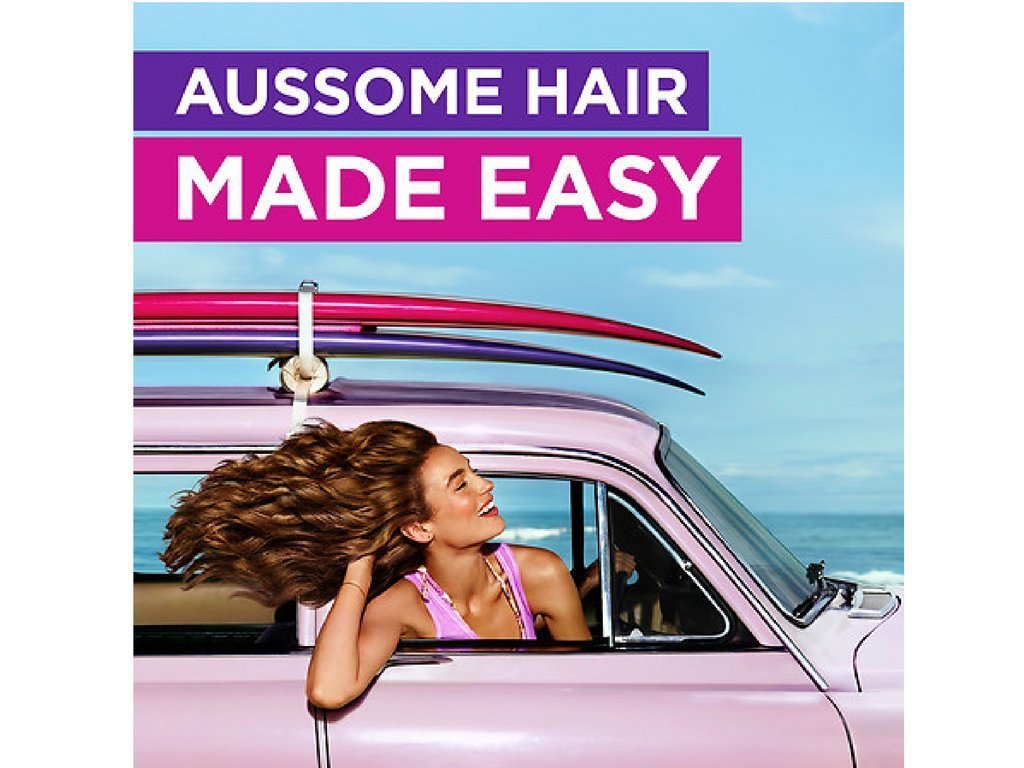 Aussie Miracle Moist duo set on display communicates a hydrated, manageable hair routine.