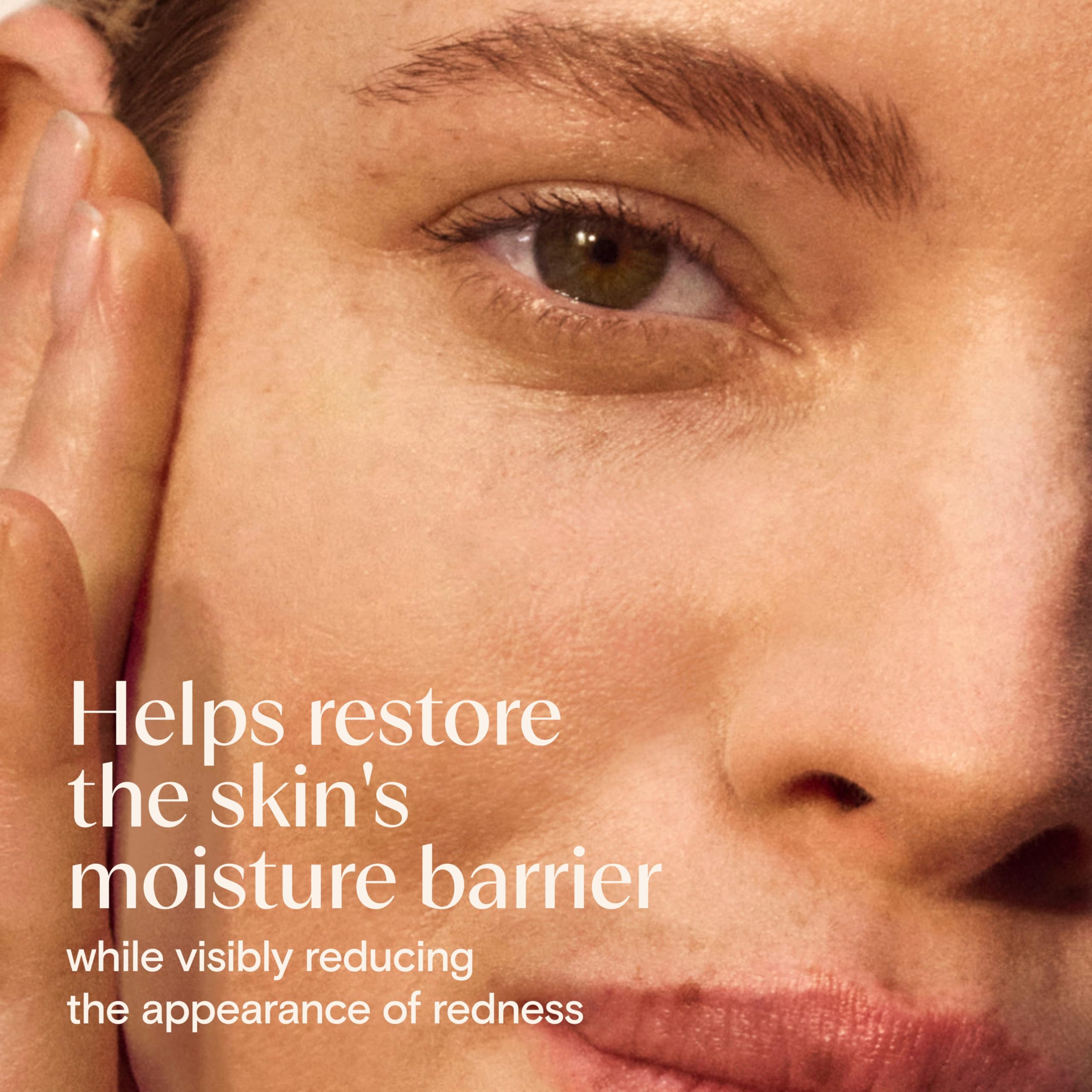 Gently applying Aveeno Calm + Restore to cheeks for redness relief