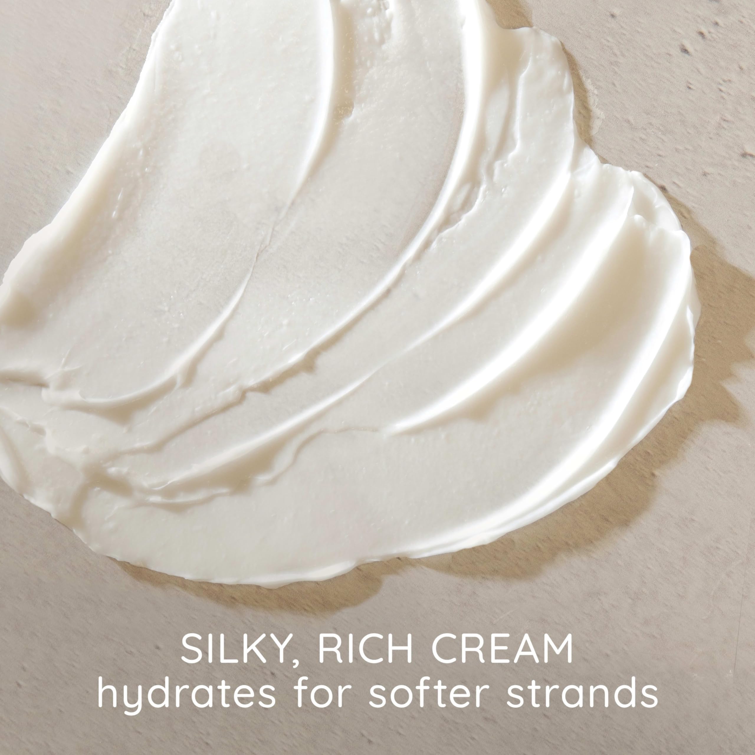 Aveeno conditioner foamy-lather on hair demonstrating gentle cleansing and body.