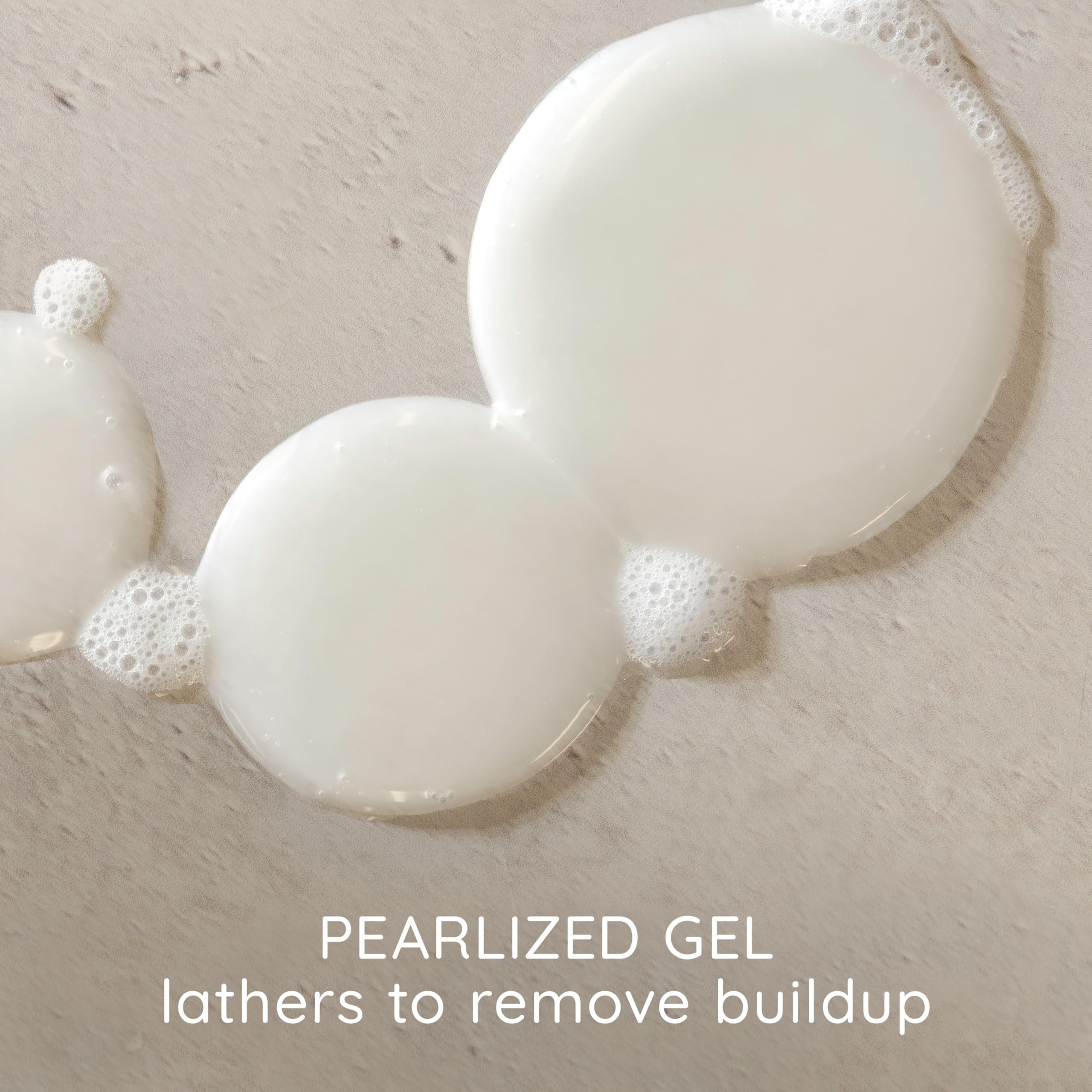 Luxurious foaming lather from Aveeno Plant Protein Blend Shampoo for gentle cleansing.