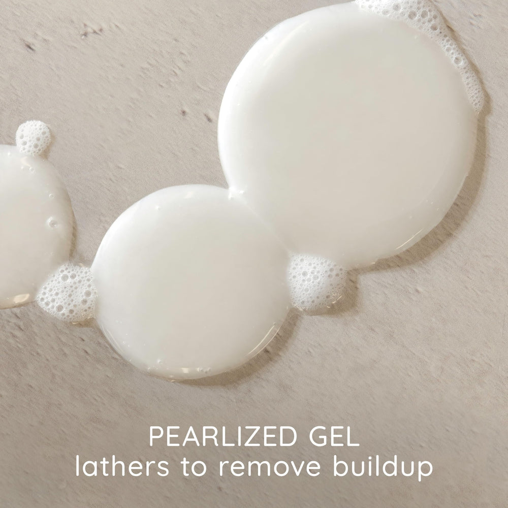 Luxurious foaming lather from Aveeno Plant Protein Blend Shampoo for gentle cleansing.