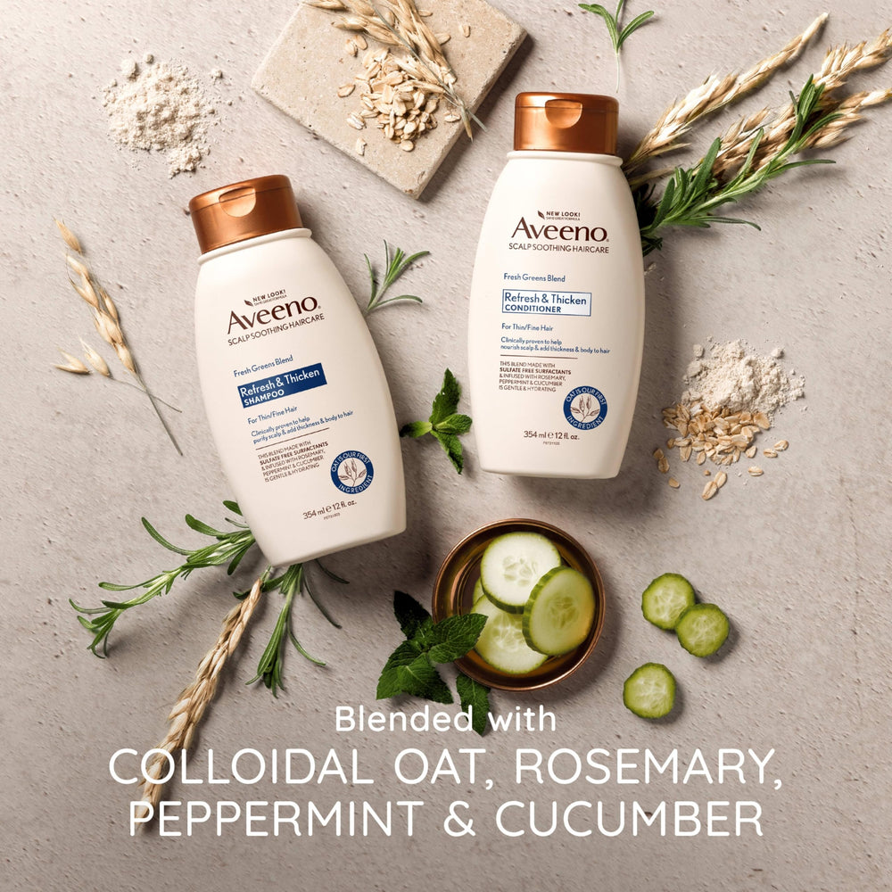 Aveeno scalp-care application in hands for a soothing routine.