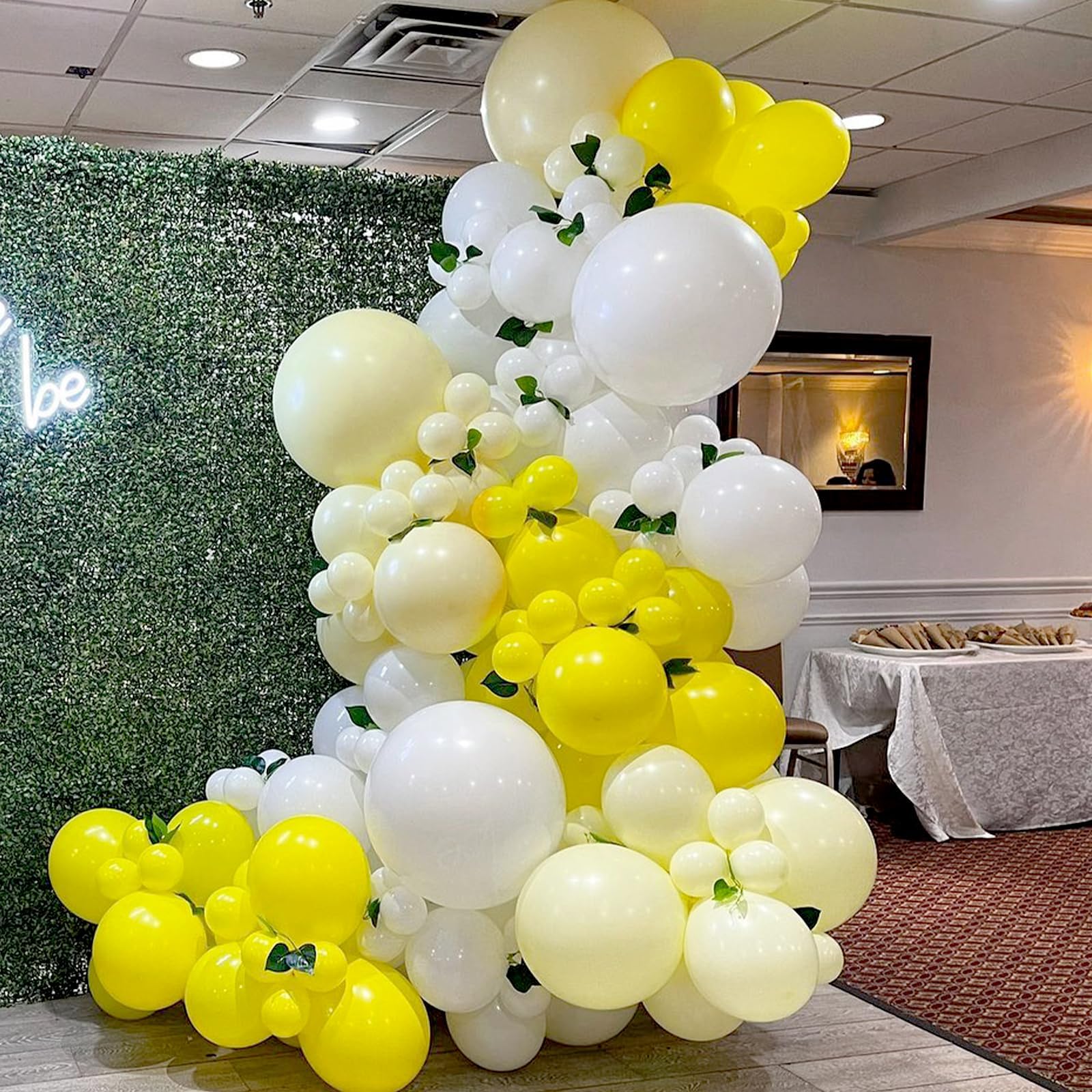 Awenztech pastel yellow 12in balloons demonstrating durability and elasticity