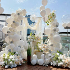Awenztech white balloons in wedding decor display.