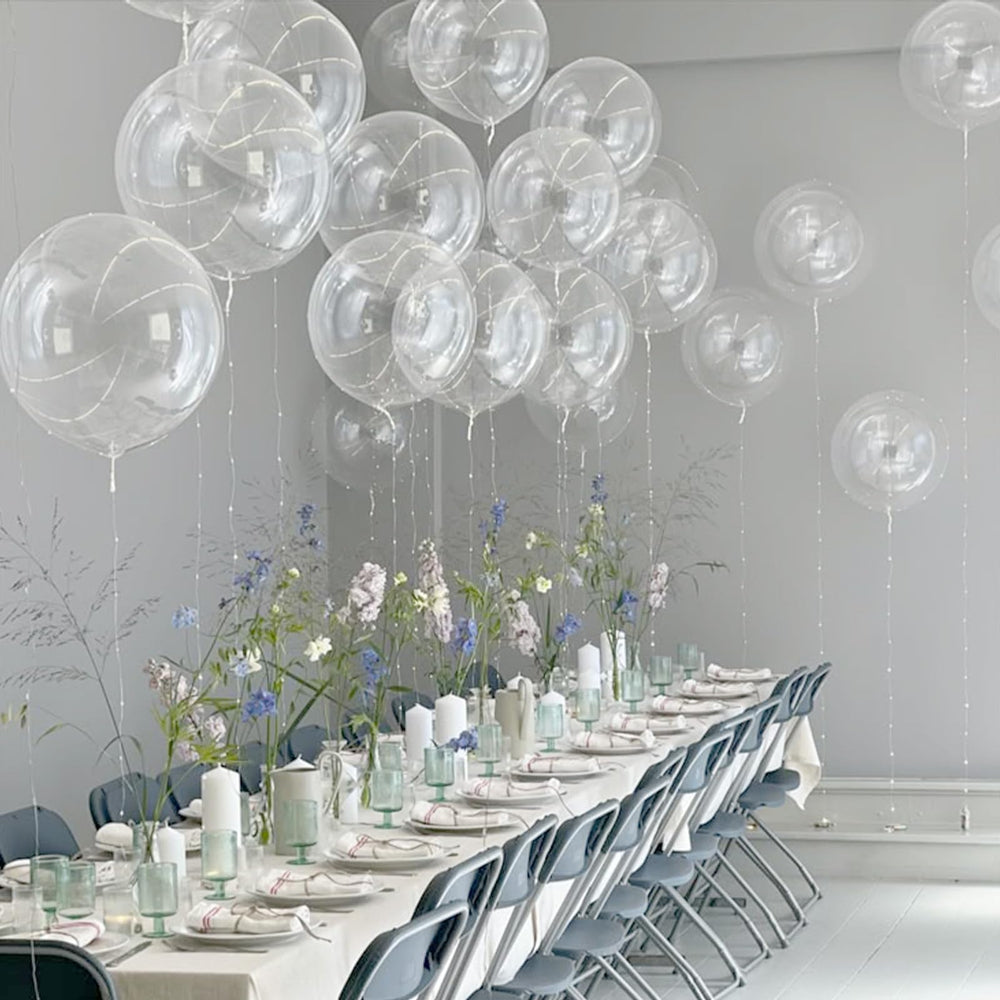 awenztech white ribbon roll 33ft showing easy tying and streamlined garland assembly.