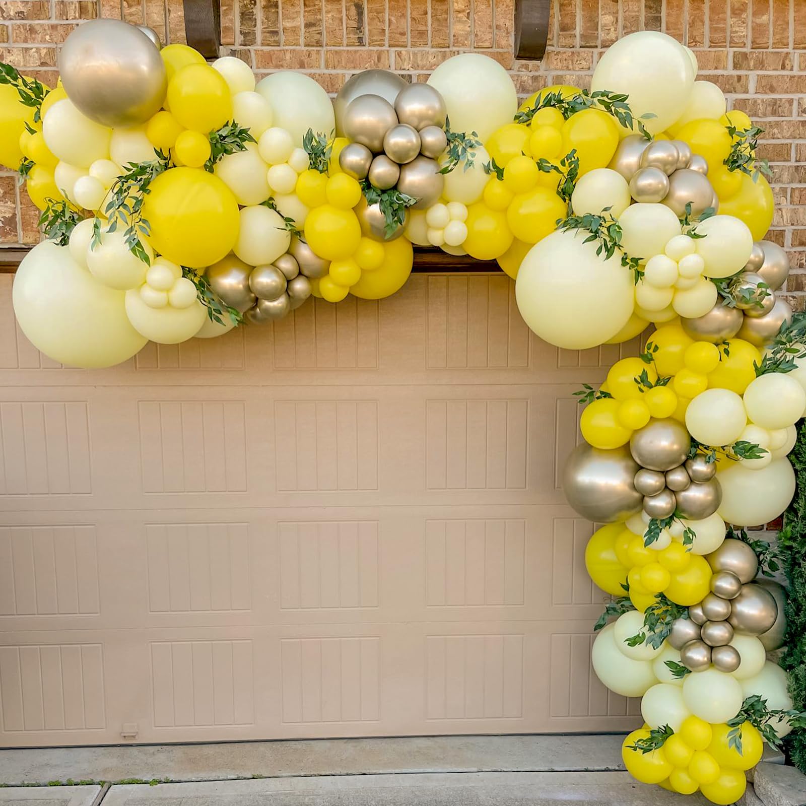 Awenztech yellow balloon garland displayed at a celebration.