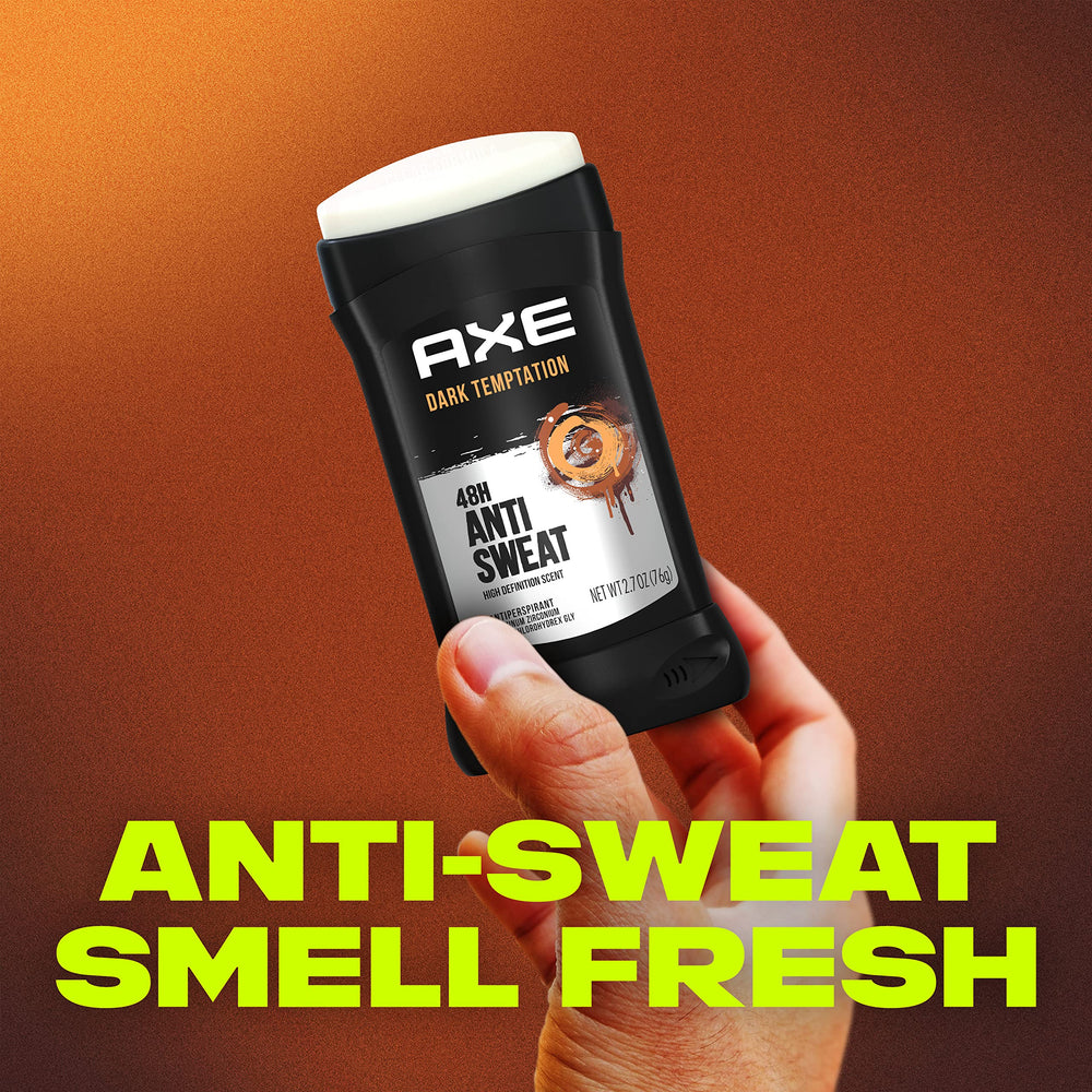 Underarm swipe by AXE Dark Temptation delivering quick-dry freshness.