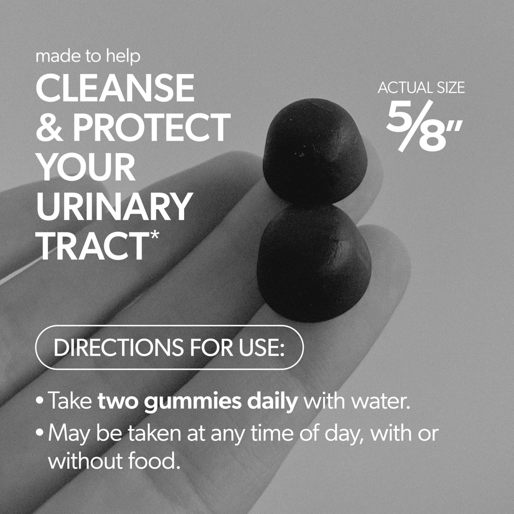 Bottle pouring gummies into hand suggests on-the-go use.