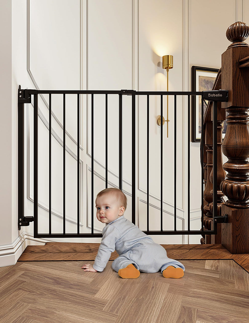 Babelio gate used in a home with kids and pets near stairs.