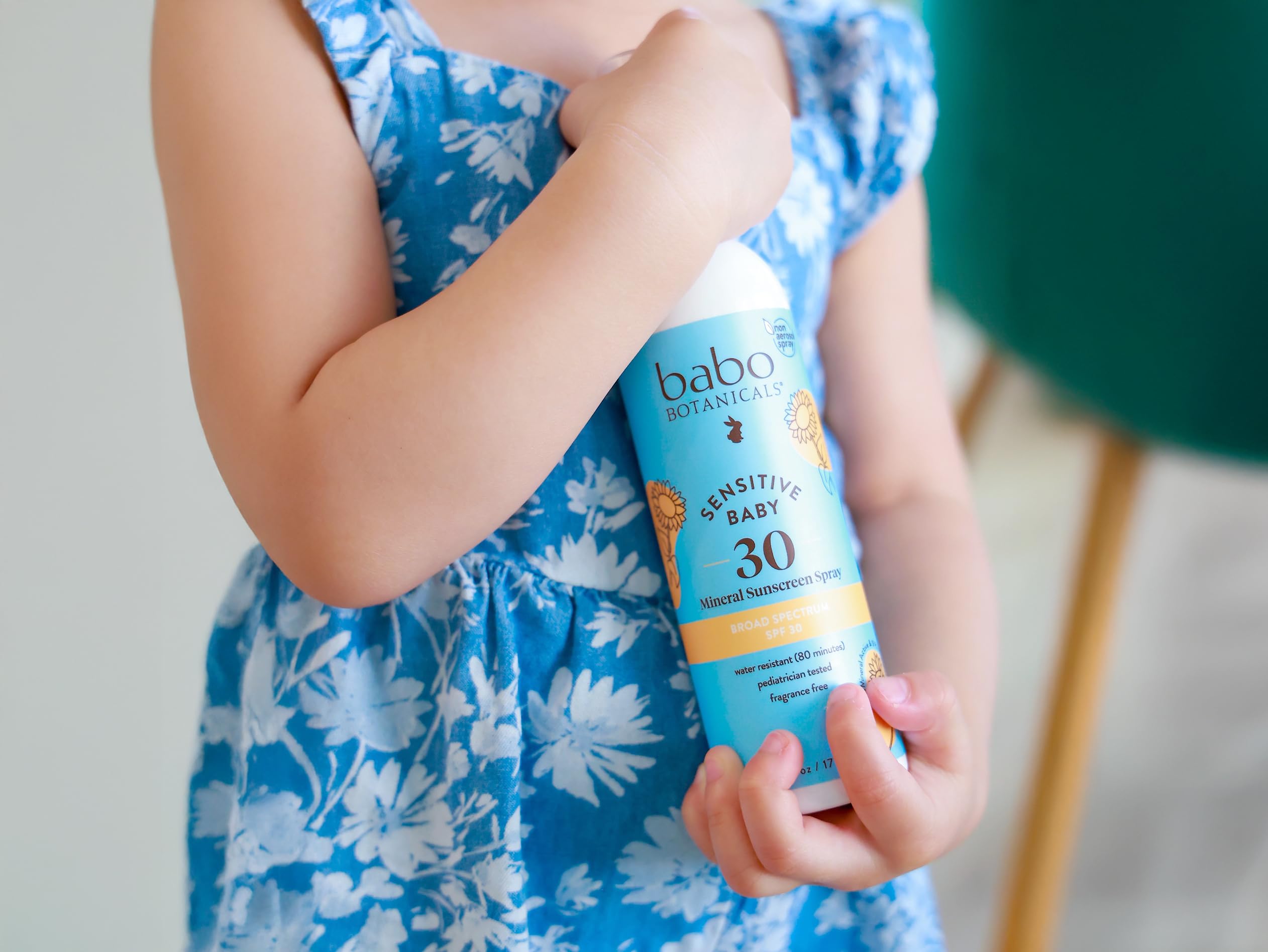 Non-aerosol spray mechanism shown for easy family use