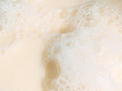 Babo Botanicals oat-calendula soothing bar highlights calming, plant-based cleansing.