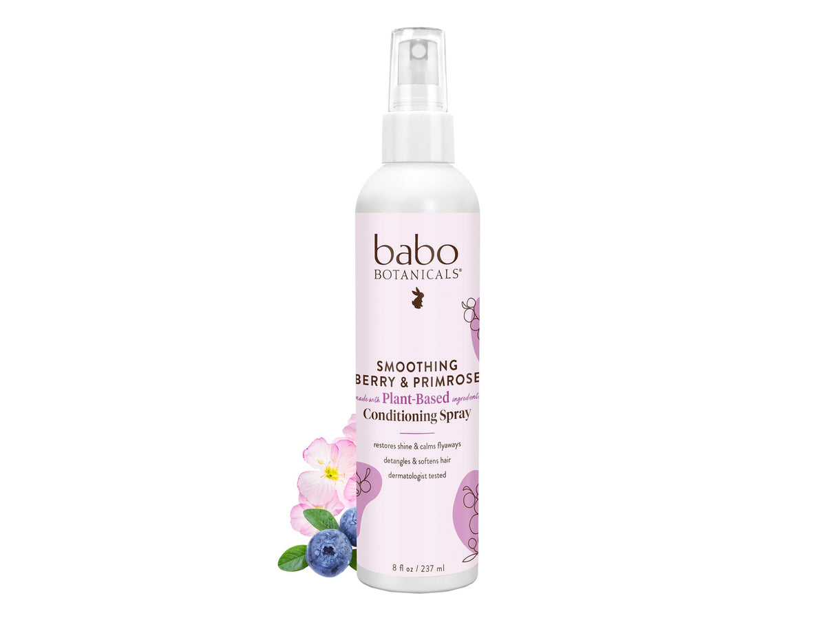 Babo Botanicals smoothing berry conditioning spray bottle for gentle detangling and frizz control.