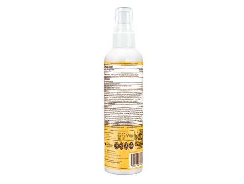 Babo Botanicals Swim & Sport SPF 30 spray on the arm for quick, even coverage.