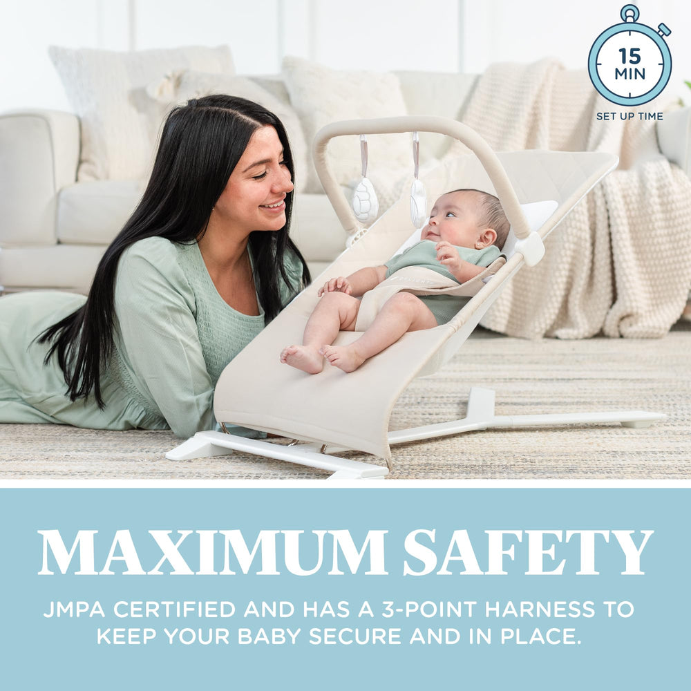 Baby Delight Alpine Deluxe Bouncer removable cover is machine washable for easy cleaning.