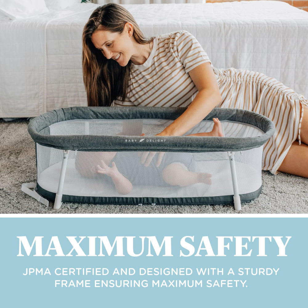 Baby Delight Snuggle Nest Bassinet folds for travel and on-the-go use