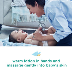 Newborn-use Baby Dove Sensitive Moisture Lotion with fragrance-free care after bath.