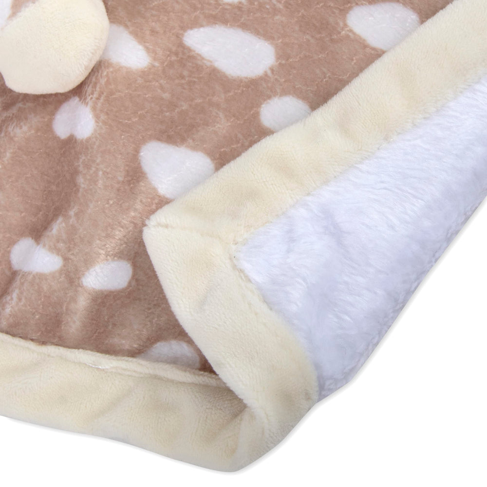 Lovey blanket swaddled in crib for nap time