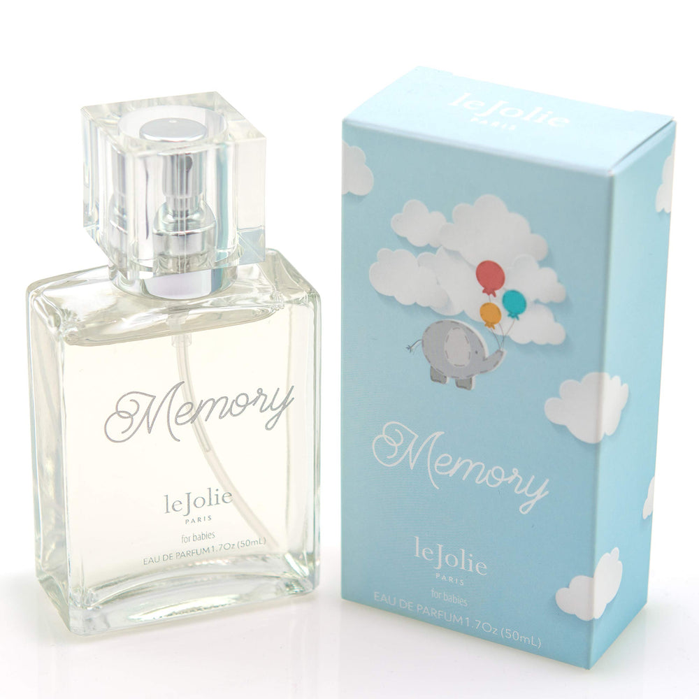 Baby Jolie Memory bottle pour showing gentle alcohol-free fragrance for daily baby freshness.