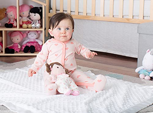 Baby Starters plush doll with rattle offers gentle entertainment.