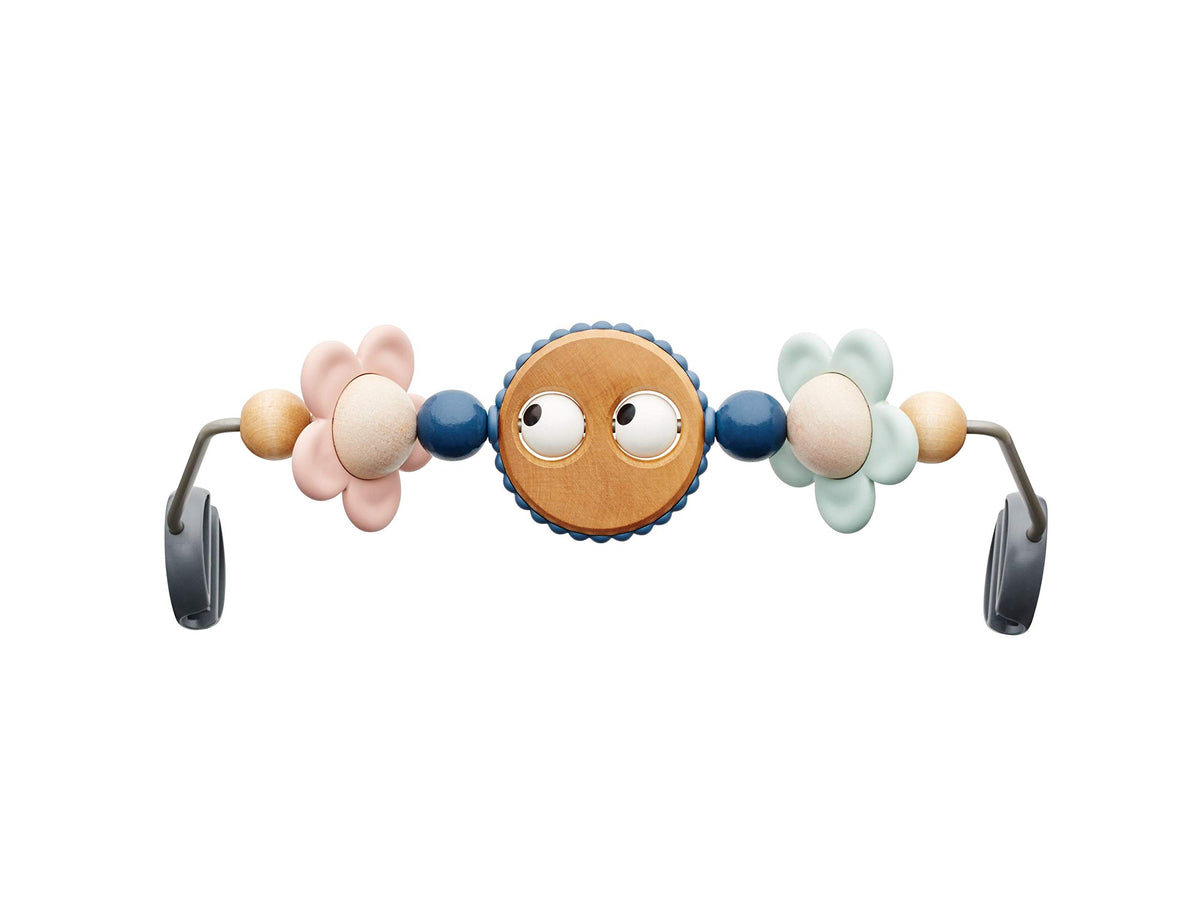 BabyBjorn Googly Eyes Pastels toy bar with bright shapes sparks visual curiosity during play.