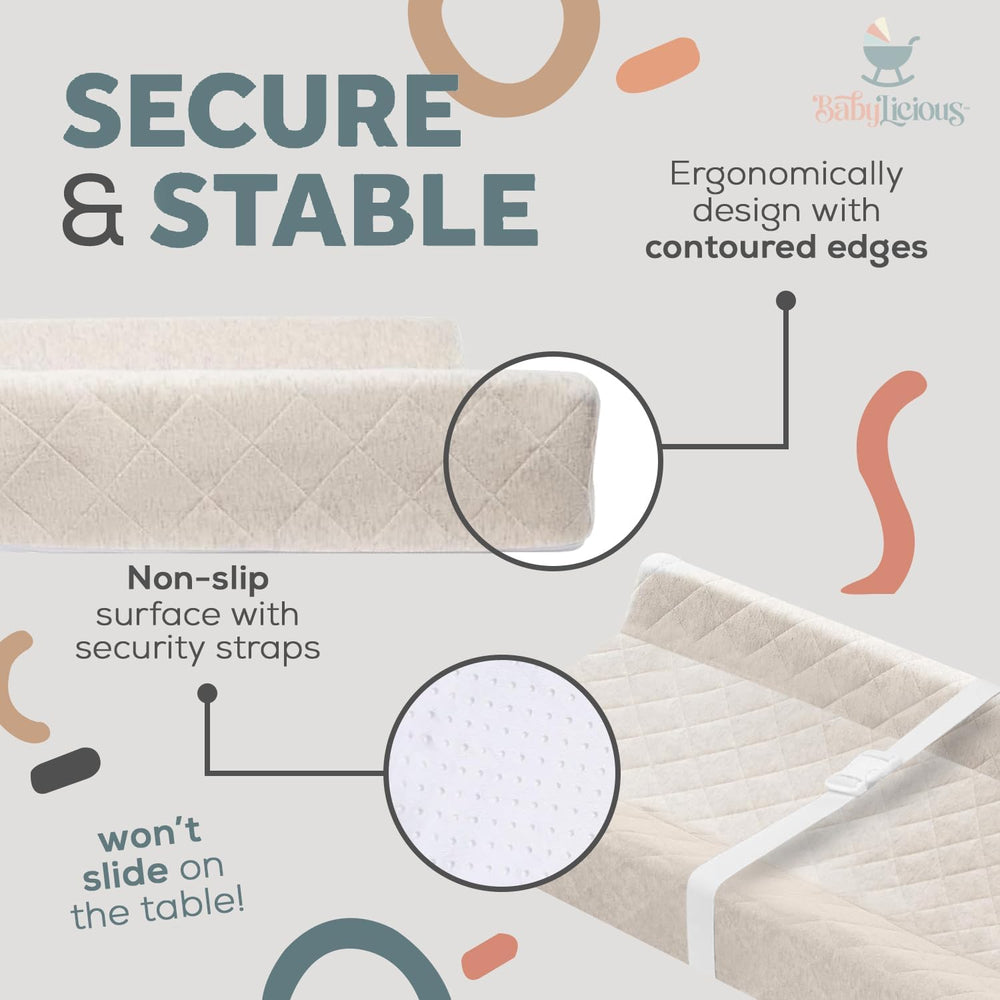 Babylicious contoured pad safety strap adds secure support during diaper routines.