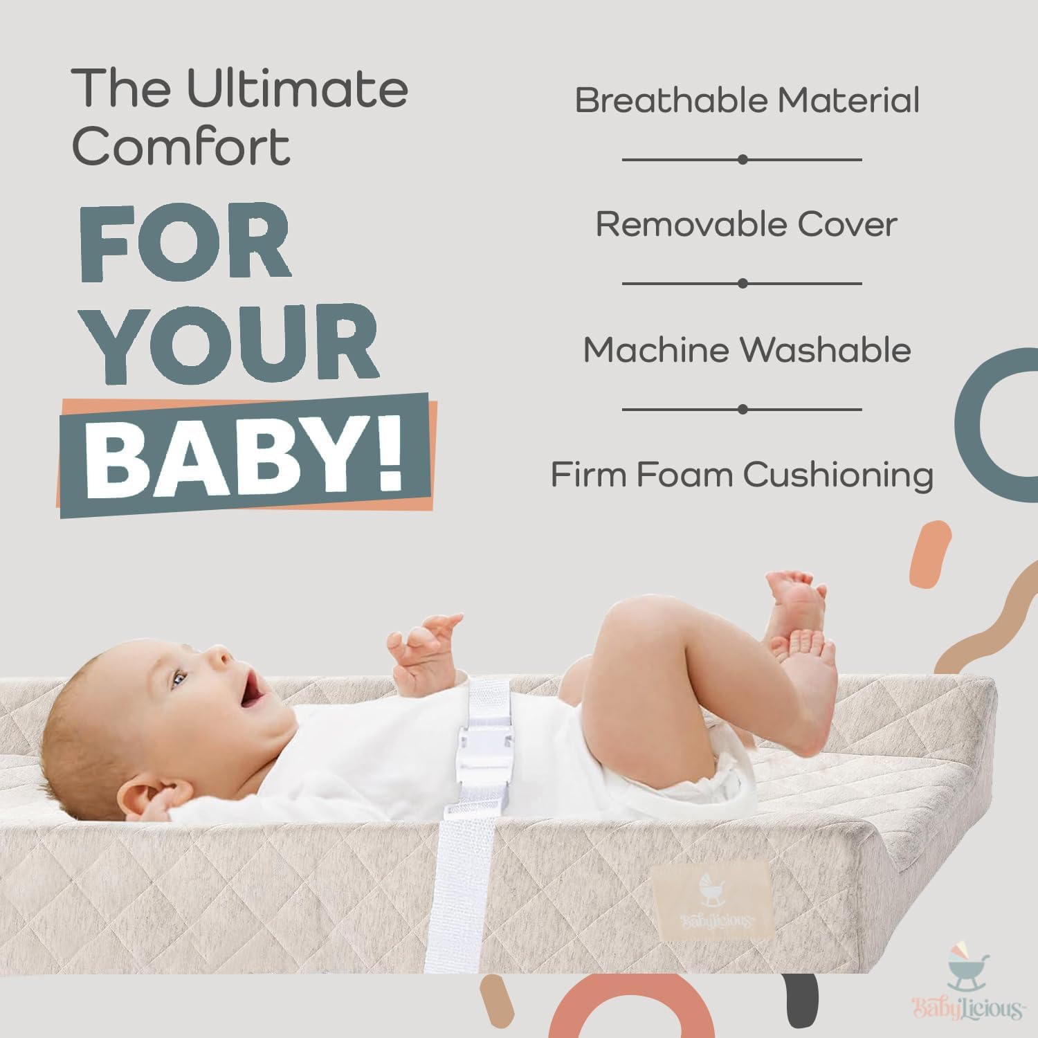 Babylicious contoured pad waterproof surface demonstrates easy cleaning after diaper changes.