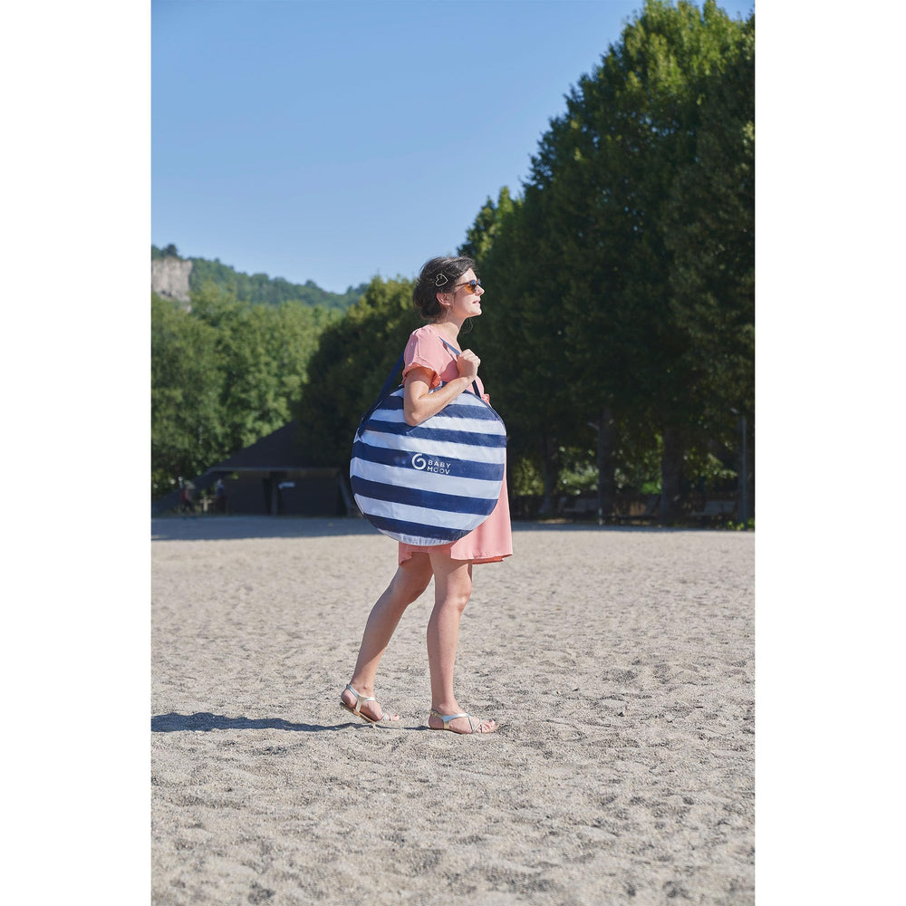 Babymoov anti-UV tent folded compactly for easy carry.
