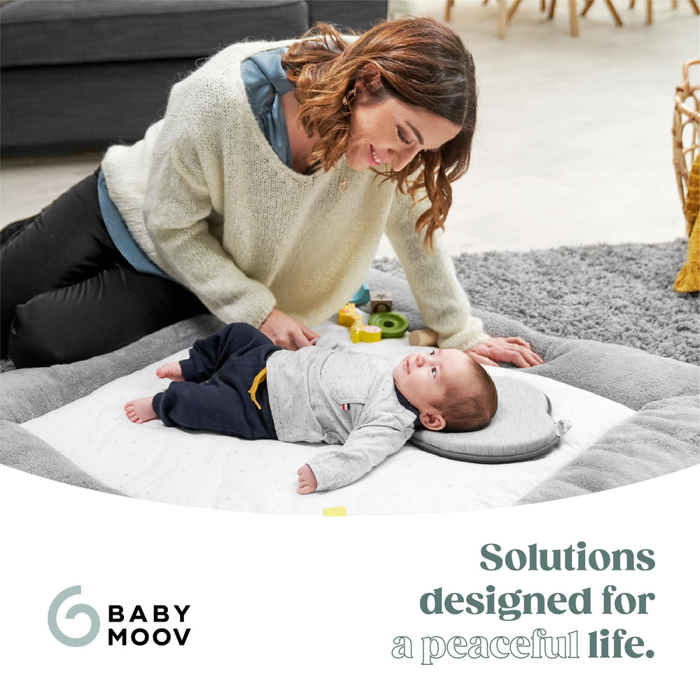 Babymoov Lovenest Organic pediatrician-designed cushion supports gentle head care.