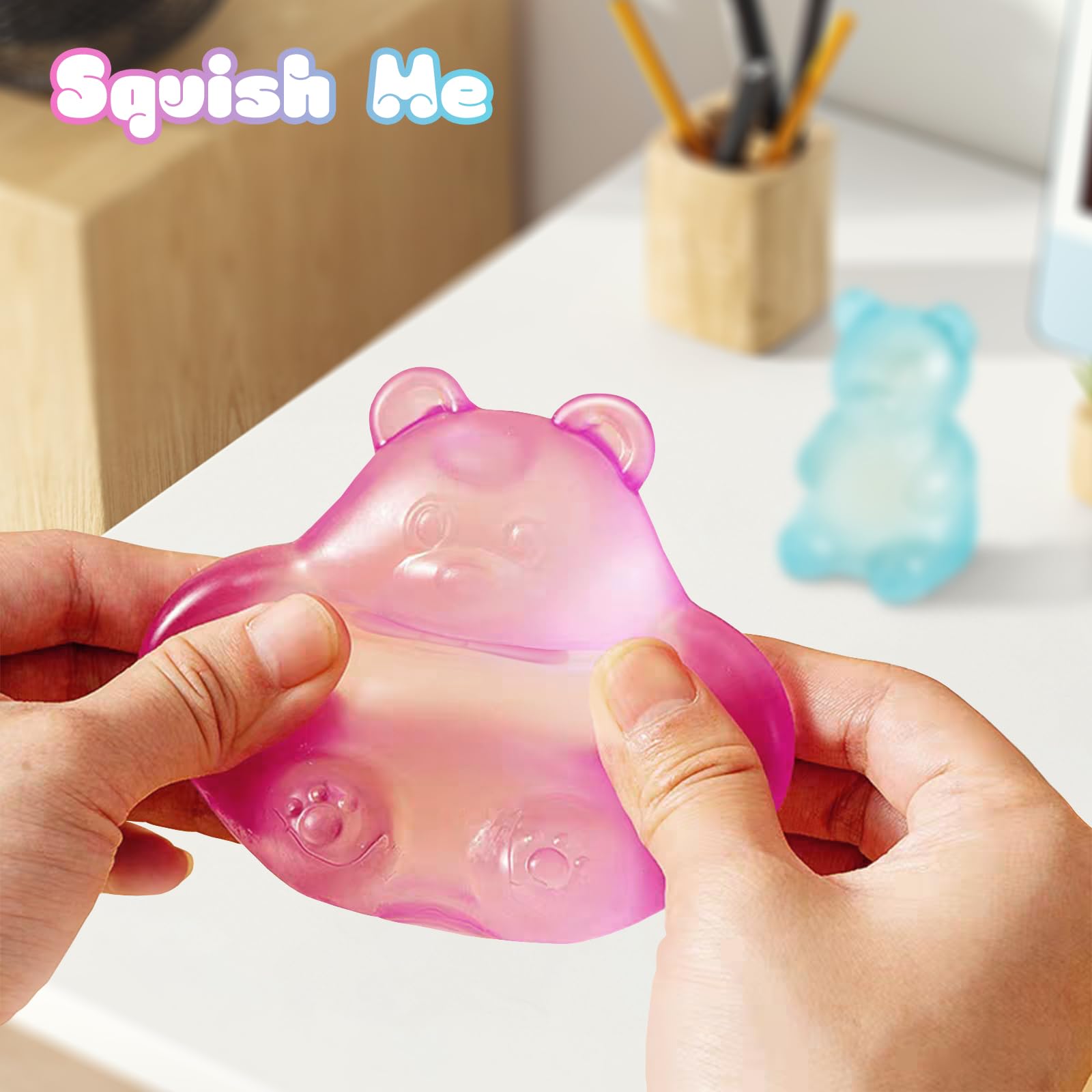 Babyye gummy bear stress ball in hand during a quick break.