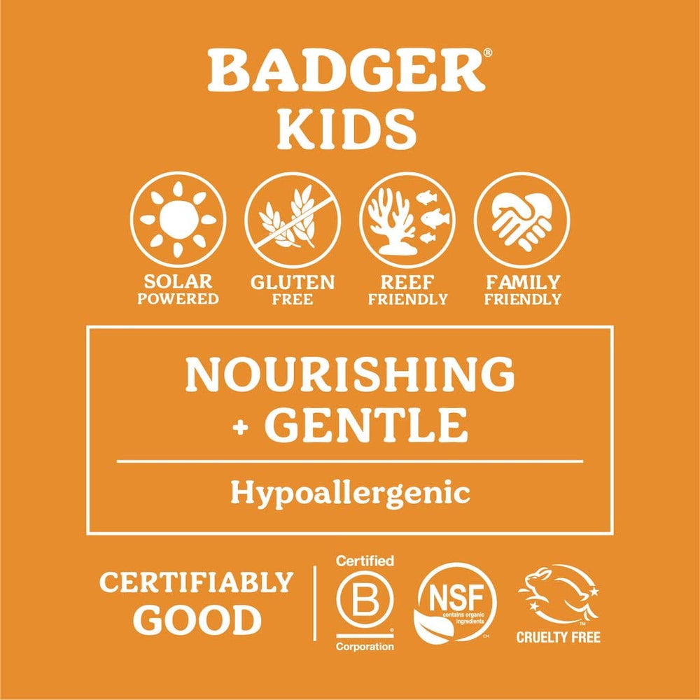Kids applying Badger sunscreen outdoors with light vanilla-tangerine scent
