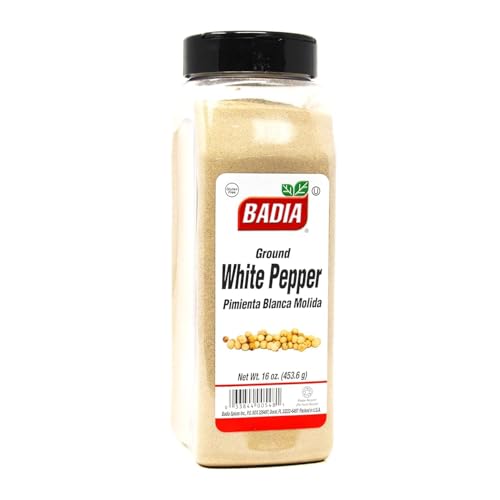 Close-up of Badia ground white pepper in a jar, fine texture ideal for delicate dishes.