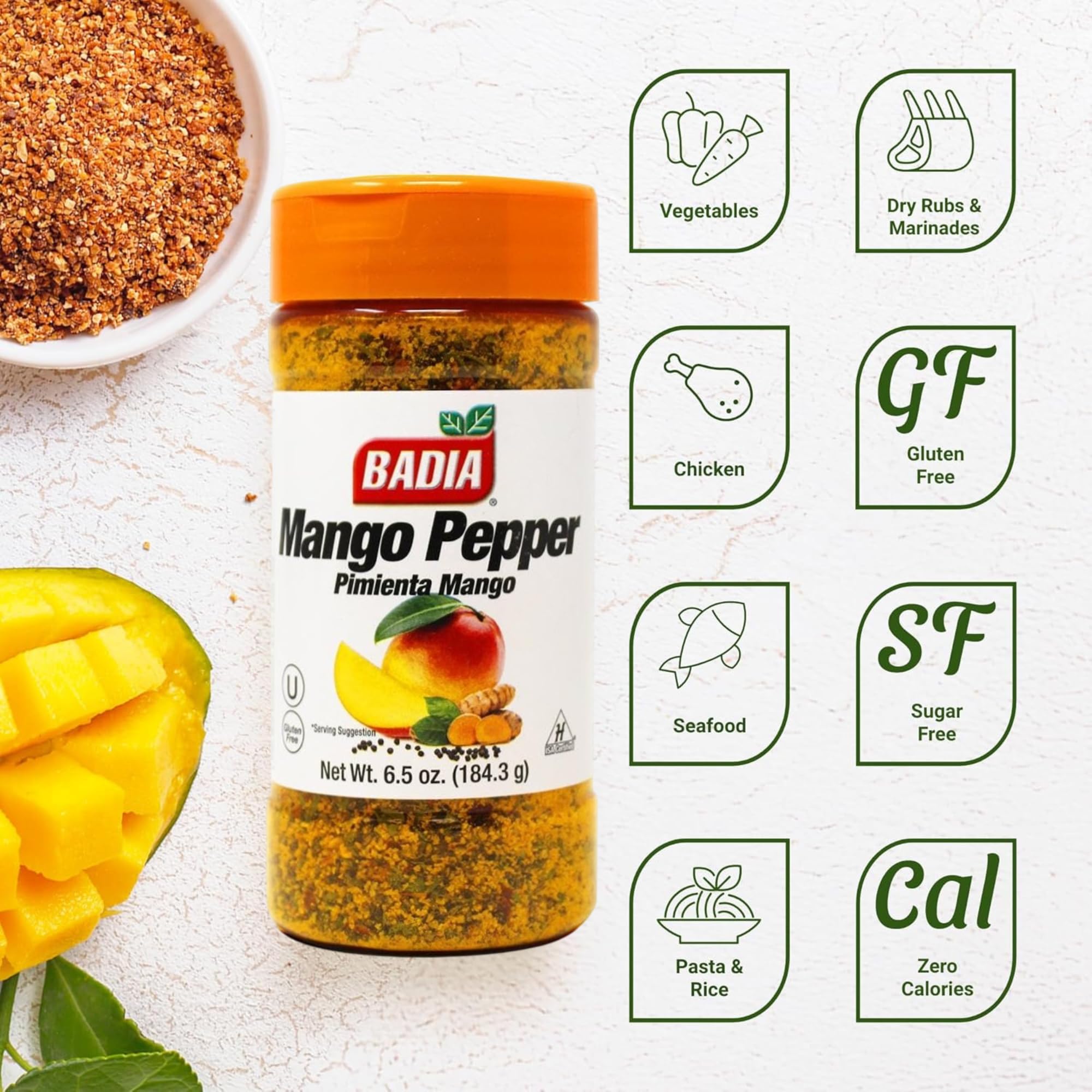 Badia Mango Pepper Seasoning sprinkled on grilled chicken for a sweet spicy glaze