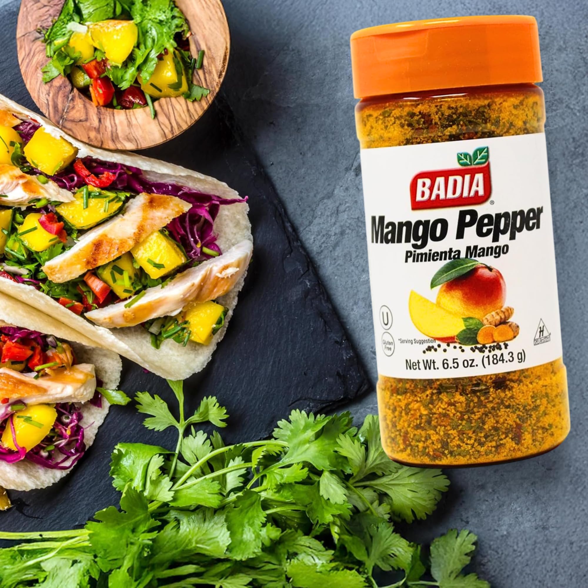 Badia Mango Pepper Seasoning in a spice bowl ready to marinate or rub