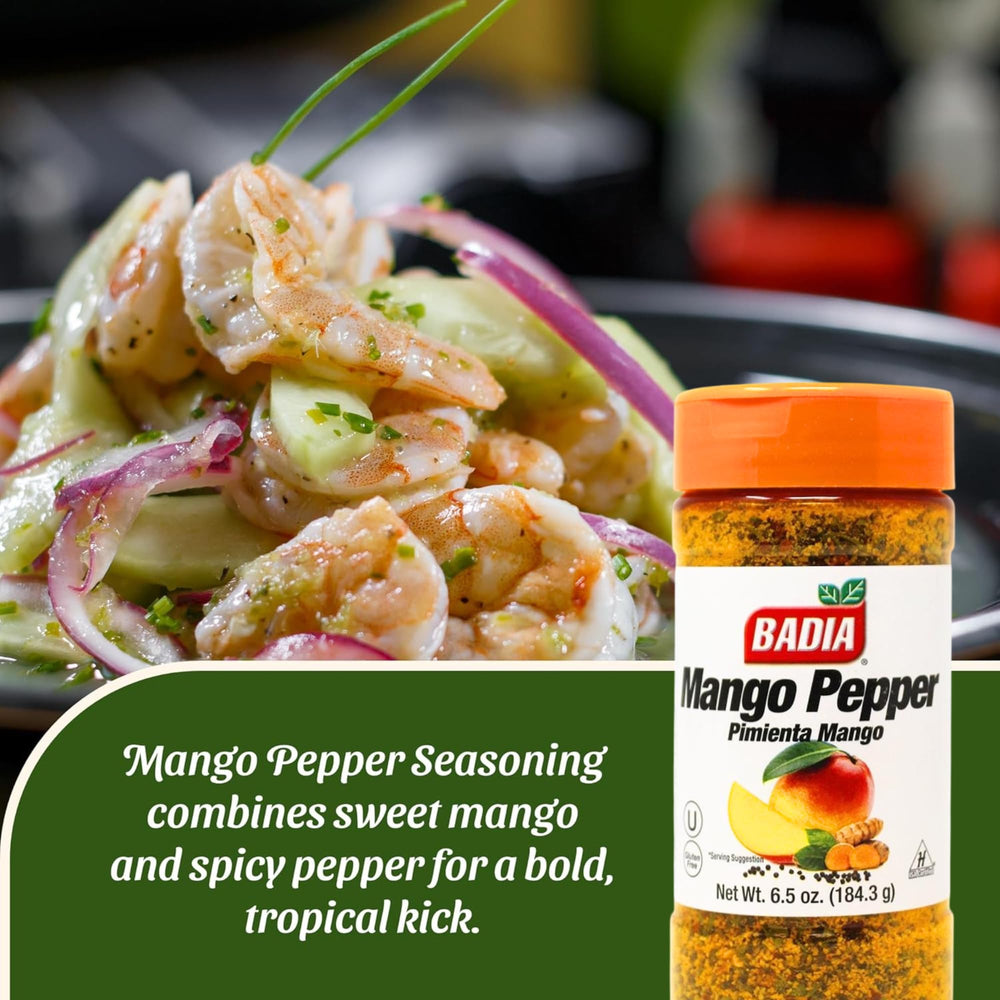 Badia Mango Pepper Seasoning shaker over a seafood dish to brighten flavors