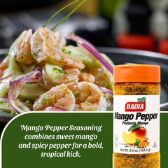 Badia Mango Pepper Seasoning shaker over a seafood dish to brighten flavors