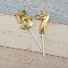 Bailym glitter gold wax candles provide elegant party ambiance.